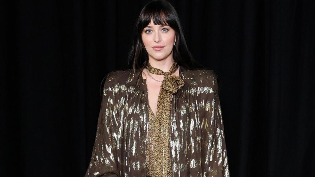 Dakota Johnson’s Plunging Cutout Dress Flaunts Her Curves at Every Turn