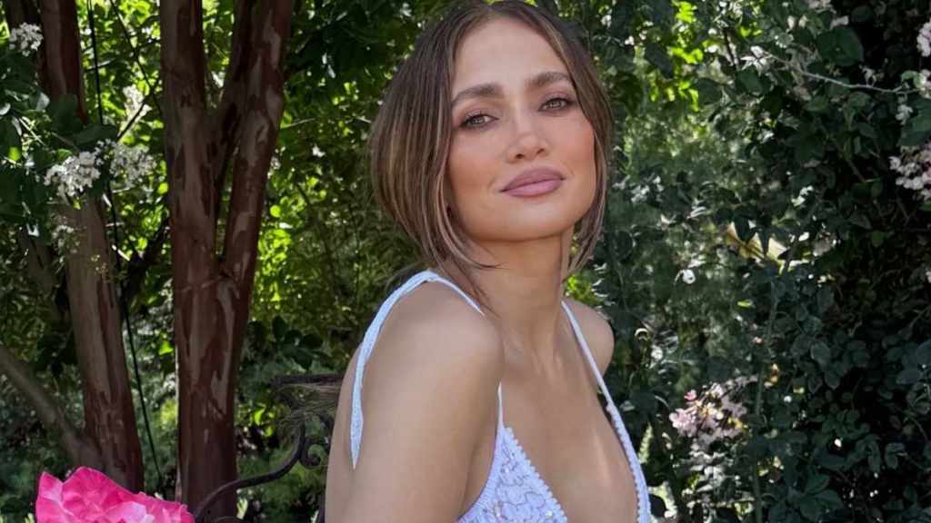 Jennifer Lopez's Top Barely Hangs on by a Single Strap for JLo Beauty