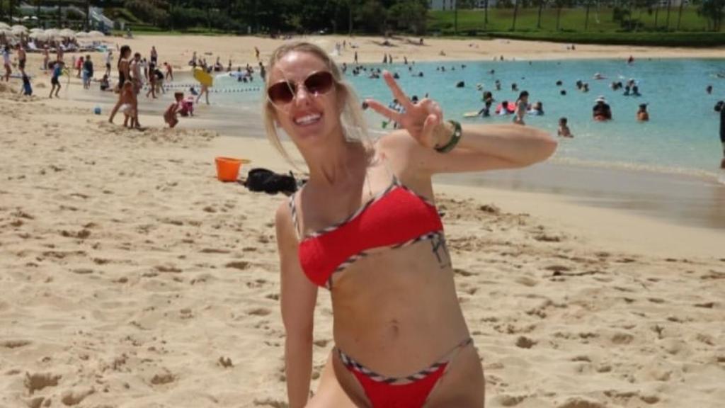Brittany Mahomes Takes Over the Beach in Red Burberry X Hunza G Bikini