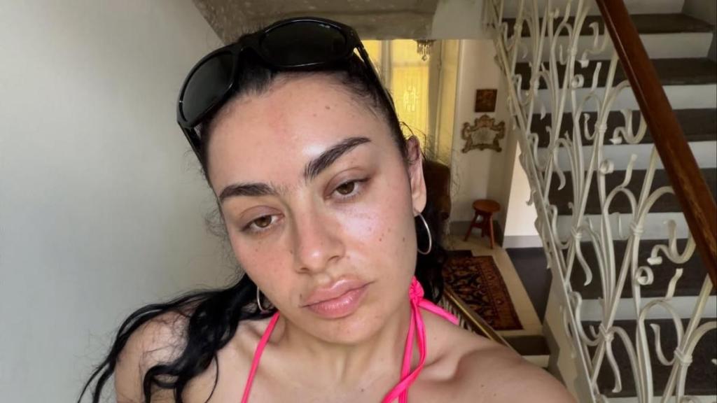 Charli XCX Nearly Spills Out of Her Barely-There Bikini