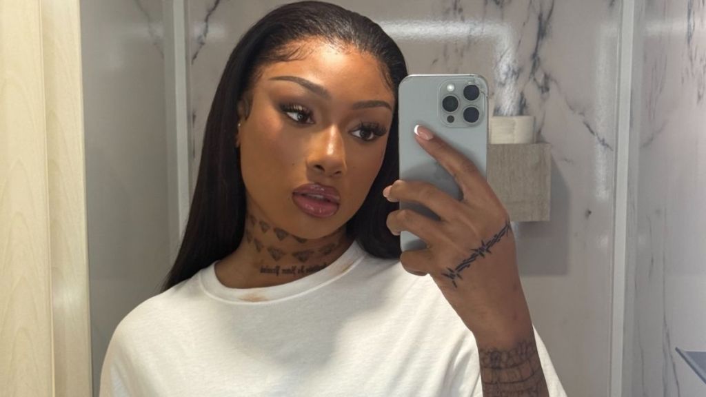 Megan Thee Stallion Goes Topless in Nothing but Micro Shorts & Fur Boots