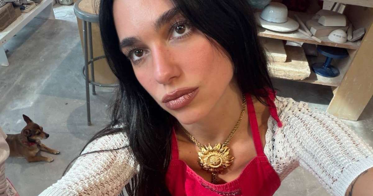 Dua Lipa’s Plunging With Jean Open-Knit Top Couldn’t Be&hellip;